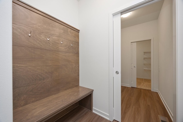 8916 Beery Pl, Johnston, IA 50131 - mudroom featuring dark wood-style floors and baseboards