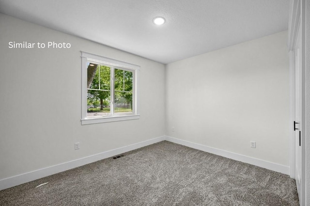 view of carpeted empty room