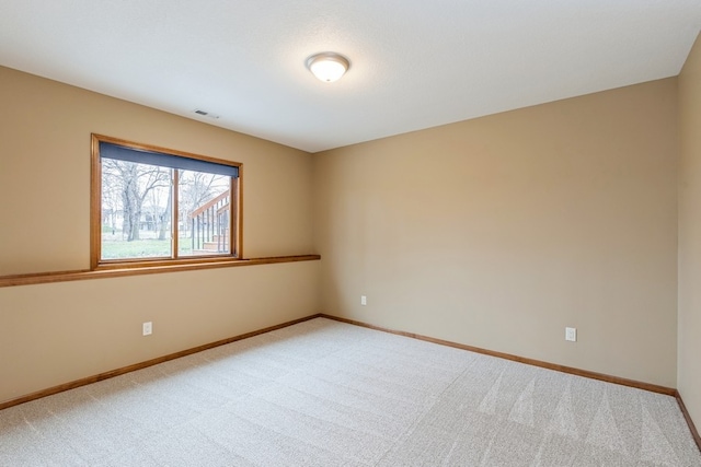 view of carpeted spare room