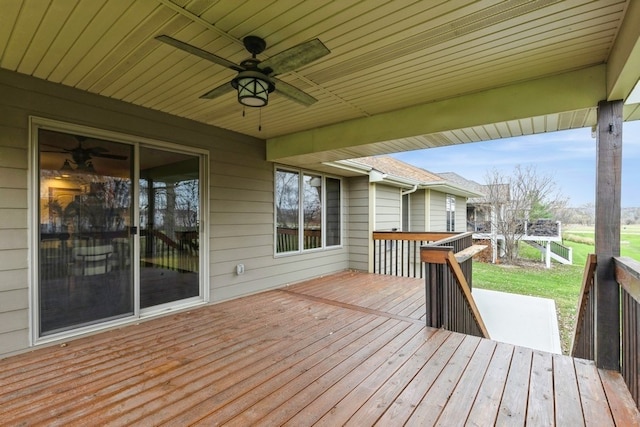 wooden terrace featuring ceiling fan