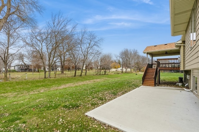 view of yard featuring a patio and a deck