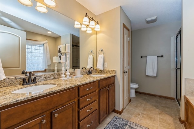 bathroom with an enclosed shower, vanity, and toilet