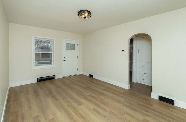 unfurnished room featuring light hardwood / wood-style floors