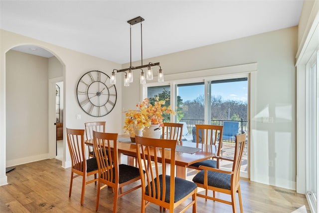 dining room featuring light hardwood / wood-style floors