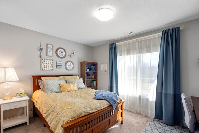 bedroom with light carpet