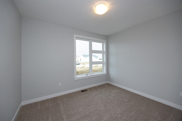 view of carpeted spare room