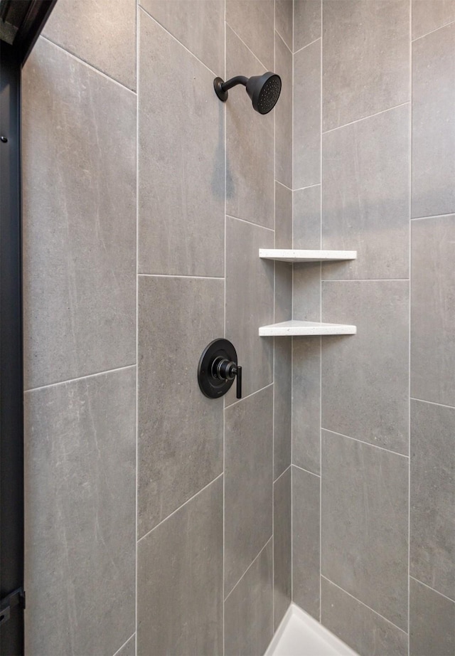 room details with a tile shower