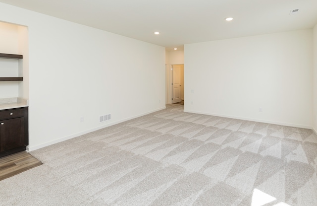 empty room with light carpet