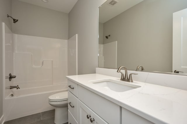 full bathroom featuring toilet, vanity, shower / bath combination, and tile patterned floors