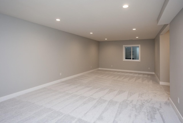 8908 Beery Pl, Johnston, IA 50131 - spare room with light colored carpet, recessed lighting, and baseboards