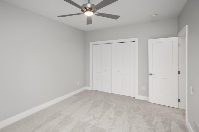 8908 Beery Pl, Johnston, IA 50131 - unfurnished bedroom featuring carpet floors, baseboards, and a closet