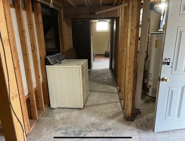 basement featuring washer / clothes dryer and gas water heater