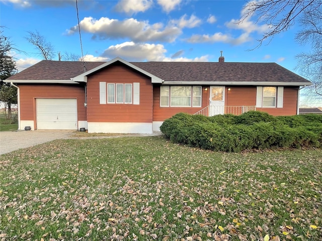 single story home with a garage and a front yard