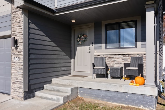 property entrance featuring covered porch