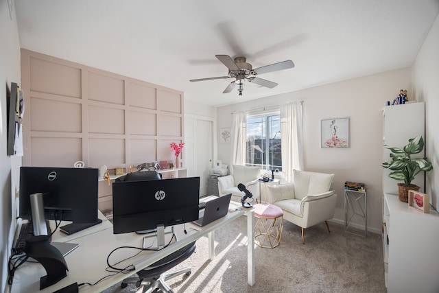 office space with carpet flooring and ceiling fan