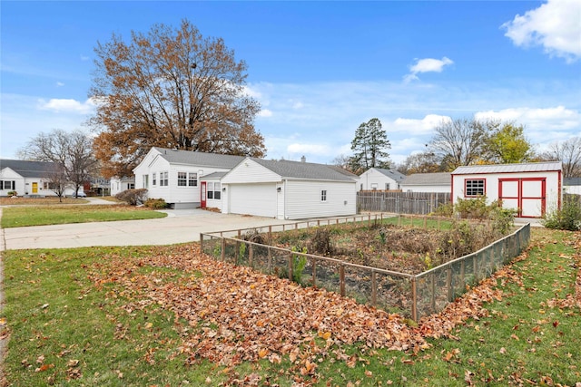 view of yard with a shed and a garage