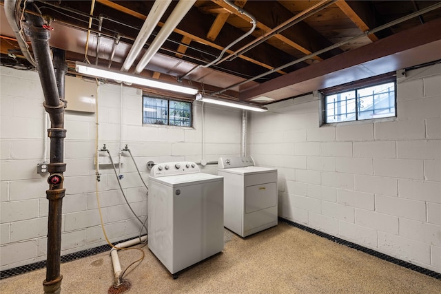 laundry area with separate washer and dryer