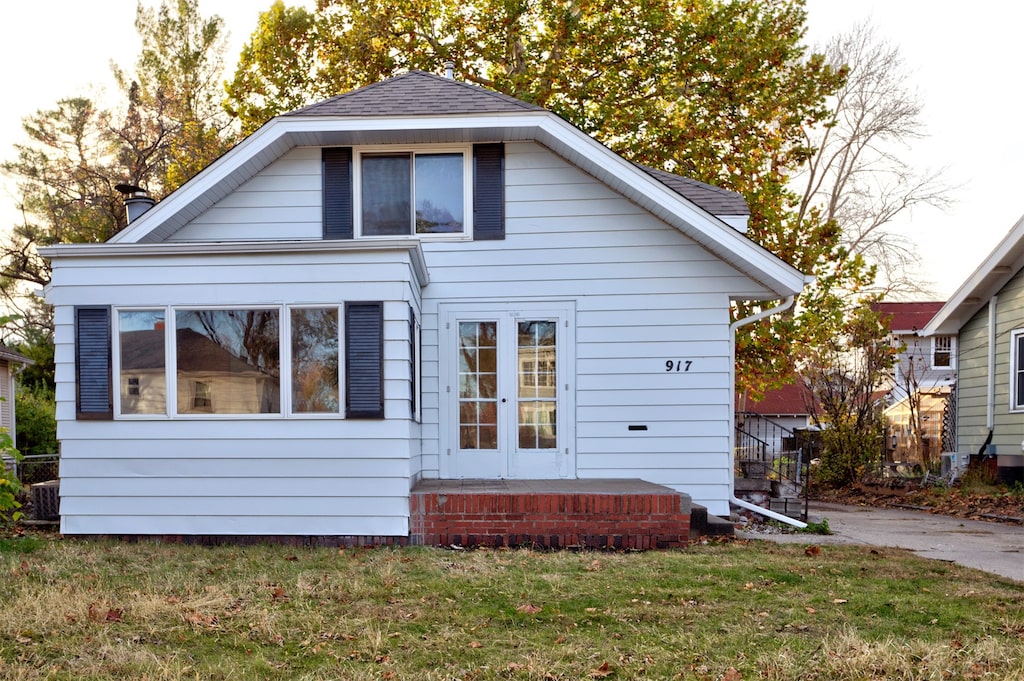 exterior space with a lawn