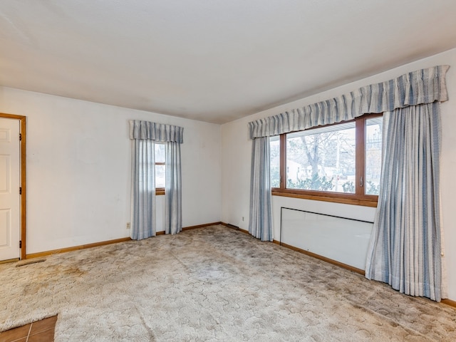 view of carpeted spare room