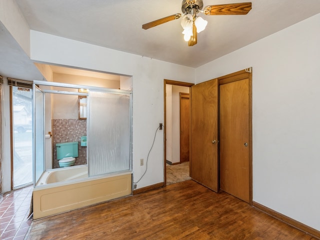 unfurnished bedroom with wood-type flooring and ceiling fan