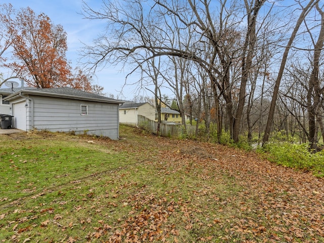 view of yard with a garage