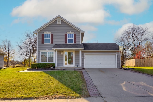 front of property featuring a garage and a front yard