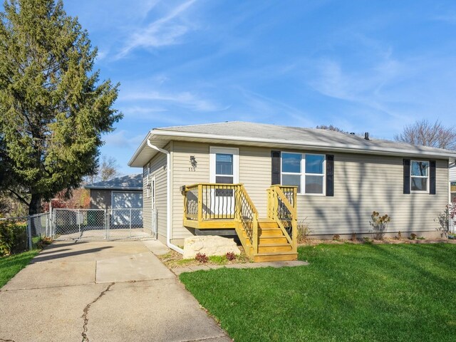 view of front of home with a front yard