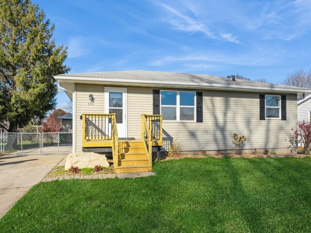 view of front of property with a front lawn