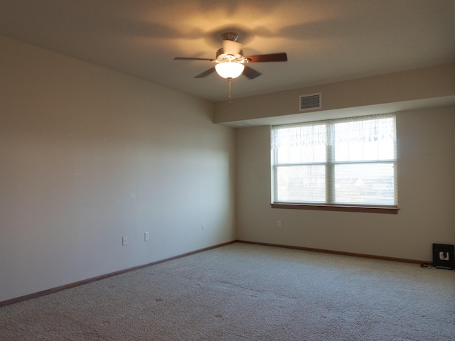1370 SW Magazine Rd Unit 206, Ankeny, IA 50023 - unfurnished room with light colored carpet, ceiling fan, and baseboards