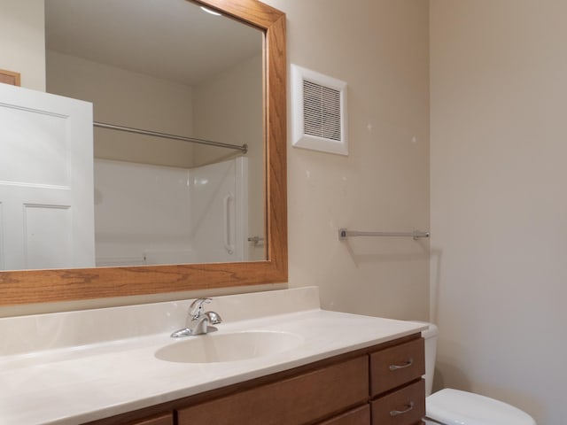1370 SW Magazine Rd Unit 206, Ankeny, IA 50023 - full bathroom with vanity, toilet, and a shower