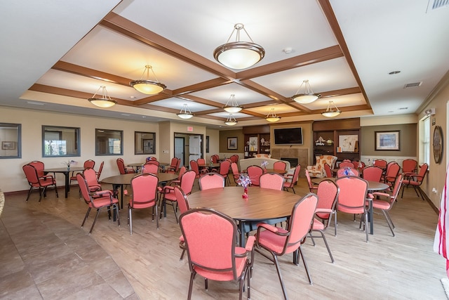 1370 SW Magazine Rd Unit 206, Ankeny, IA 50023 - dining room with baseboards, coffered ceiling, light wood-style flooring, and beam ceiling