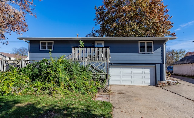 view of front of house with a garage, stairs, and concrete driveway