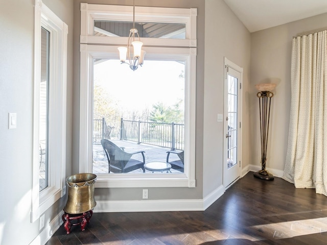 1885 Glen Oaks Dr, West Des Moines, IA 50266 - foyer with a chandelier, baseboards, and dark wood finished floors