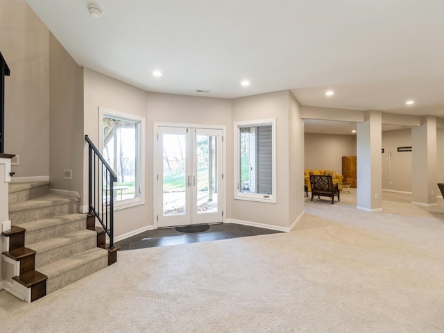 1885 Glen Oaks Dr, West Des Moines, IA 50266 - entrance foyer with french doors, stairway, recessed lighting, baseboards, and dark carpet