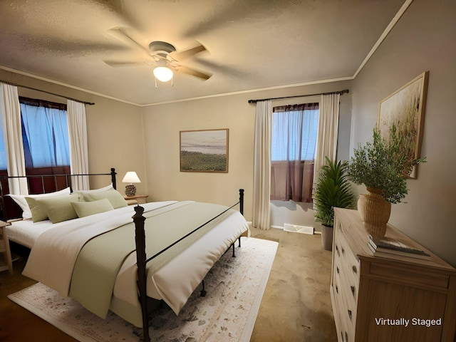 bedroom featuring crown molding and ceiling fan