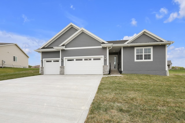 view of front facade with a garage, stone siding, concrete driveway, and a front yard