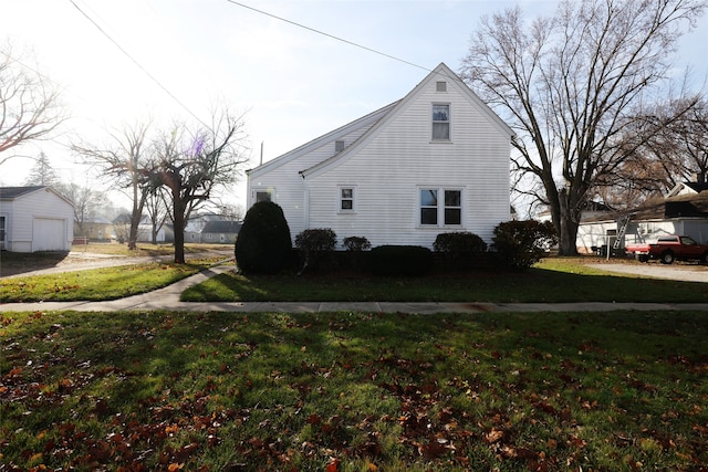 view of home's exterior with a lawn