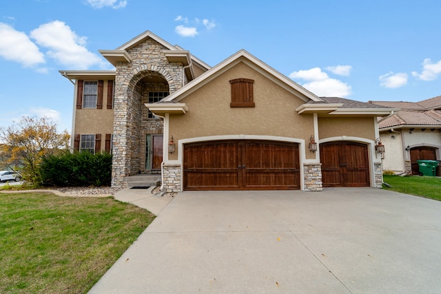 view of front of property with a garage