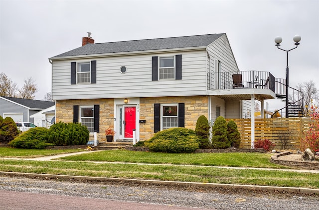 view of front of home with a front yard