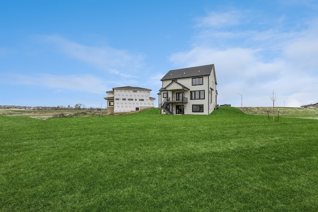 exterior space with a rural view and a lawn