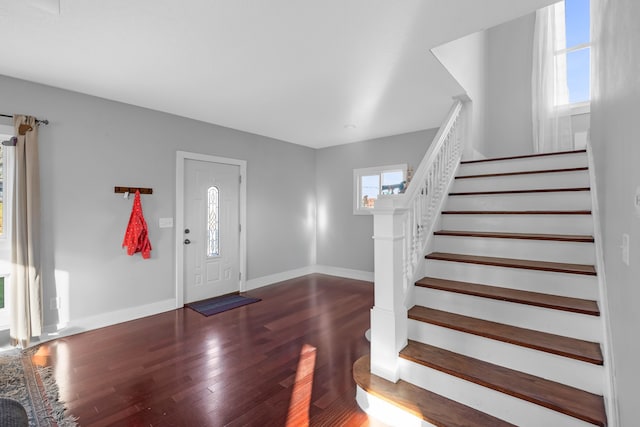 entrance foyer featuring dark wood-type flooring