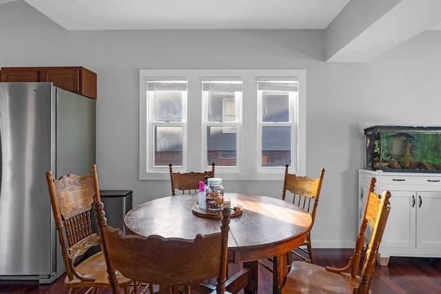 dining area featuring dark hardwood / wood-style flooring