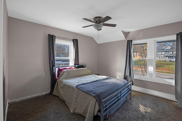 bedroom featuring vaulted ceiling and ceiling fan