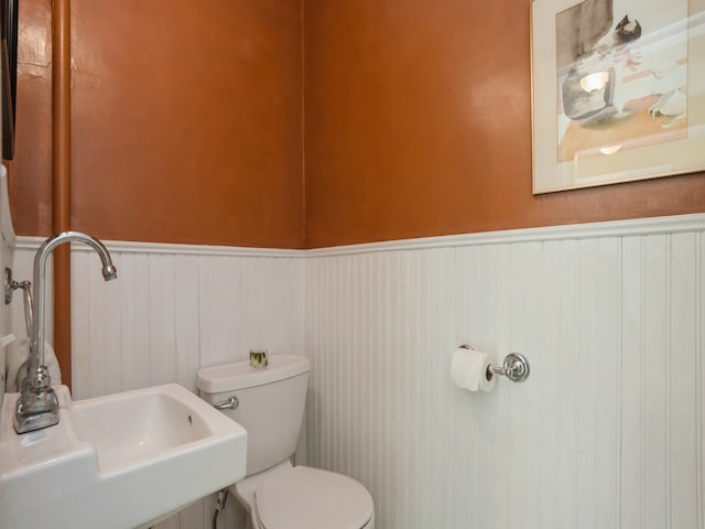 bathroom with toilet and sink