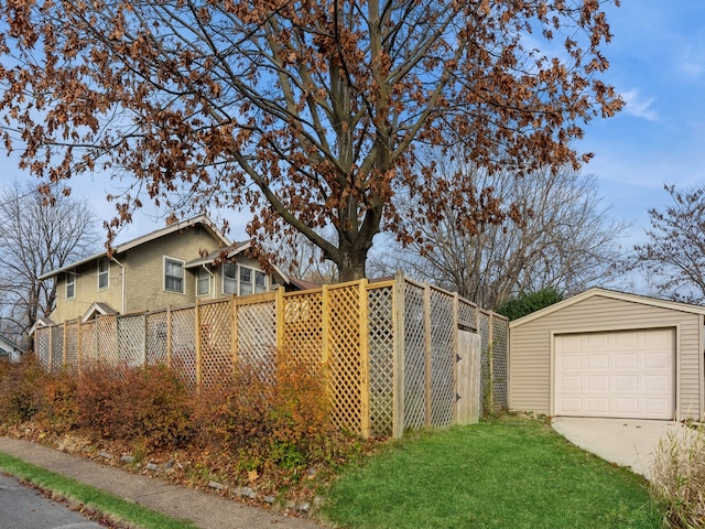 view of property exterior featuring an outbuilding and a garage