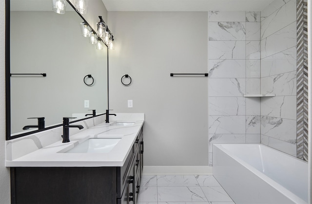 full bathroom featuring marble finish floor, baseboards, a sink, and double vanity