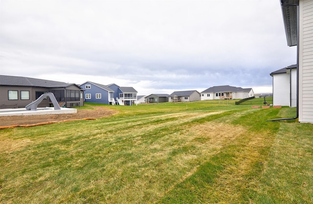 view of yard with a residential view