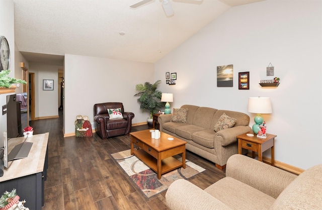 living room with lofted ceiling, ceiling fan, and dark hardwood / wood-style floors