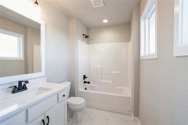 full bathroom with vanity, shower / bathtub combination, and toilet