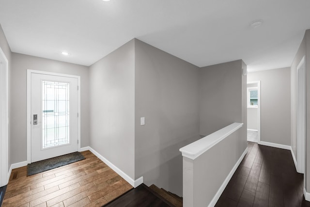 foyer with dark hardwood / wood-style flooring